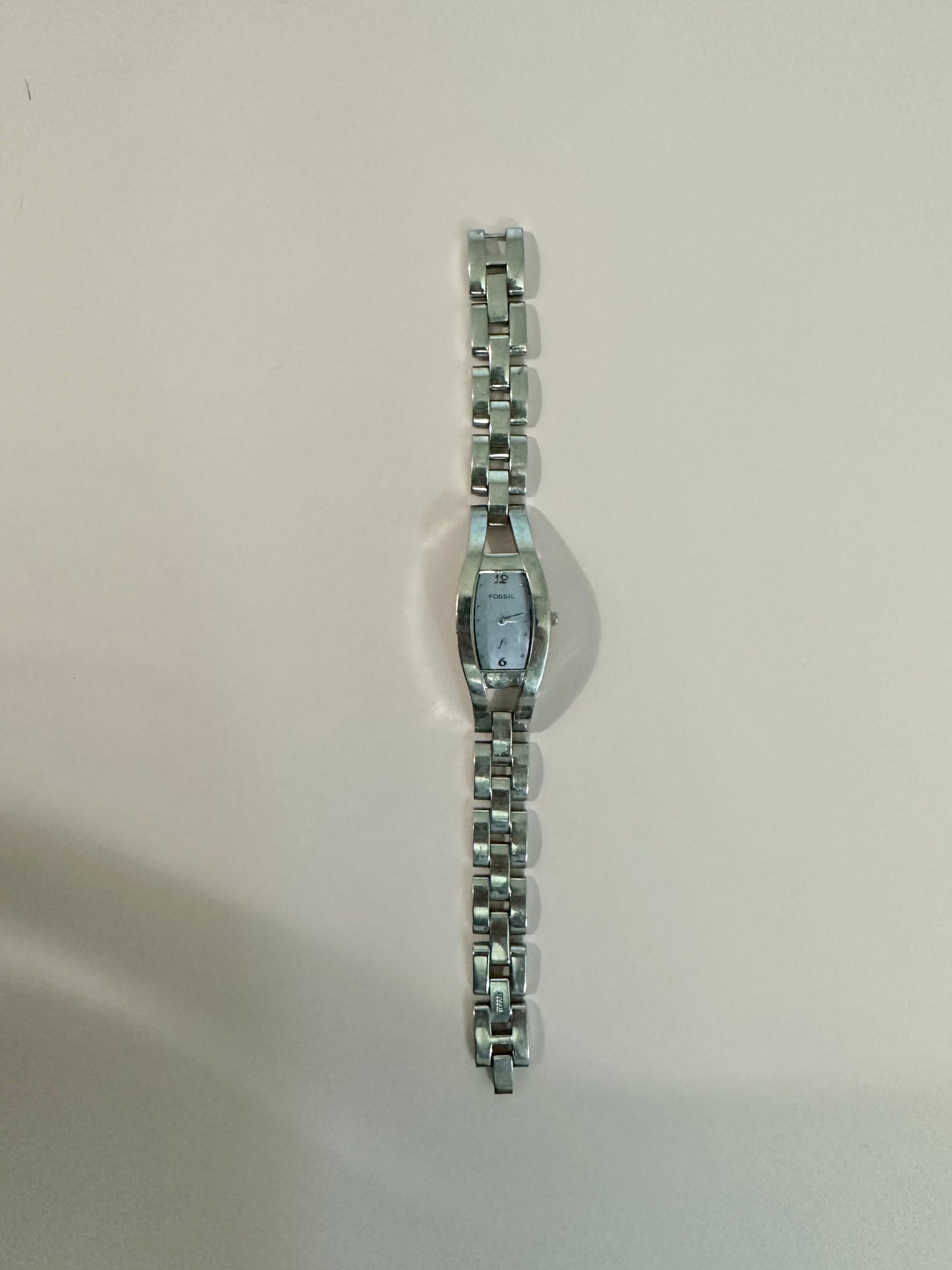 Silver Fossil band with purple face 7inches